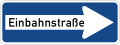 Some countries, like Germany, show text on one-way signs (Einbahnstraße means "one-way street")