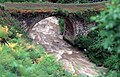 The Azat River passing under an old style bridge