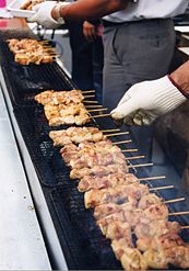 Yakitori being grilled