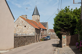 The church and surroundings in Cosqueville