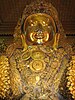 A statue of Maha Muni Buddha enshrined in a temple/pagoda at Mandalay