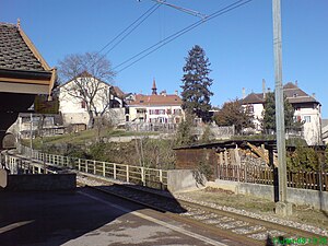 Station platform with a shelter