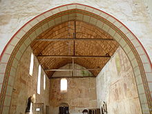 Photographie des peintures murales dans l'église Saint-Hilaire d'Asnières-sur-Vègre.