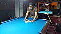 Image 13A player racking the balls (from Pool (cue sports))