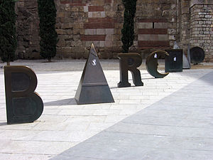 Individual, artistic letters on the ground