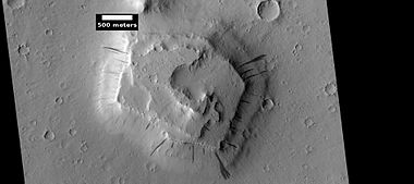 Dark slope streaks on layered mesa, as seen by HiRISE under HiWish program