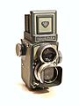 Rolleiflex 4x4 "Baby": Utiliza filme 127 e produz negativos de tamanho 4 cm x 4 cm.