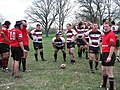 The Rogues gathering for a scrum against the Tri-City Barbarians RFC