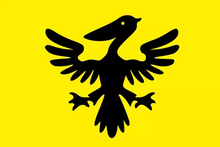 Drapeau montrant un pélican noir sur fond jaune.