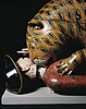 An 18th-century mechanical toy shaped as a tiger savaging a man