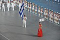 The 2008 Summer Olympics Parade of Nations signs were in French, English and Simplified Chinese.