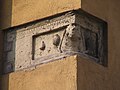 Roero house on Grassi street, detail of the corner piece