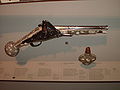 Matching pistol and flask, German, probably 1579, both decorated with finely carved antler inlay