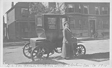 Bertha Van Hoosen pictured with her Woods Motor car