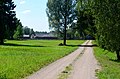 Lapkalnys village inside the forest