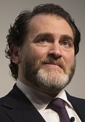 Michael Stuhlbarg est Tommy