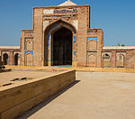 Brick enclosure of Mirza Baqi Baig Uzbak's tomb, south of the tomb of Nawab Isa Khan the Younger