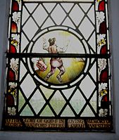 St Matthew's Church Bristol. Bunyan Roundel. Christian casts off his burden