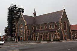 Kyrkan sedd från norr, september 2012. Klocktornet göms av byggnadsställning.