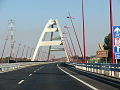 Entrance to the bridge, showing a sign for the M8 motorway