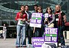 A photograph of a group of people protesting