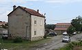 L'ancienne gare de Tallone, une route remplace la plate-forme de la voie ferrée.