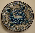 Dish with running quadrupeds