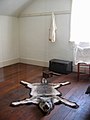 Wolf rug in the adults' bedroom on the second floor of the commanding officer's quarters.