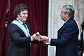 President–elect Javier Milei receives the presidential sash and staff from outgoing president Alberto Fernández in 2023