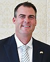 Photographic portrait of Kevin Stitt