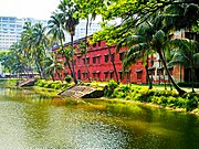 Dr. Muhammad Shahidullah Hall, three-storied main building at the west side of the pond