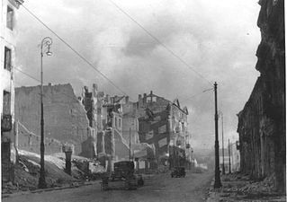 NARA copy #47, IPN copy #50 (No image caption, in section This is how the former Ghetto looks after having been destroyed) Nalewki Street, looking South from the gate at Nalewki/Gęsia/Franciszkańska intersection.