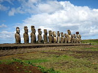 Moai of Easter Island facing inland, Ahu Tongariki, c. 1250–1500, restored by Chilean archaeologist Claudio Cristino in the 1990s