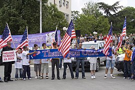 Kosovo Albanians with US flags and banners, 2009