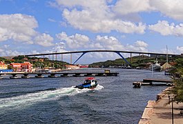 The Queen Juliana (background) bridge replaced the Queen Emma bridge (foreground) for vehicle traffic