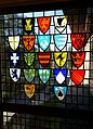 Stained glass artwork from Norway's mapping authorities headquarters. Svalbards coat of arms in the bottom left. Missing crown and incorrect colors in the artwork