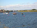 Looking seaward towards the Scottish Maritime Museum's pontoons, with the closed 'Big Idea' building and footbridge in the background.