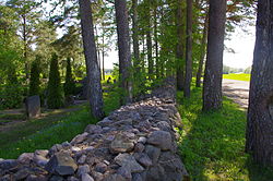 Wall of Lelle cemetery.