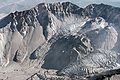 October 2006: Glaciers in the crater of Mount St. Helens. The Crater Glacier is shaped in a horseshoe around the new domes that have developed in the crater. The west lobe of the glacier is visible in the bottom right and two more rock glaciers can be seen to the left of the east lobe.