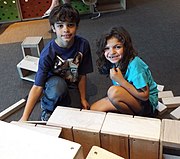 Children playing with educational building blocks