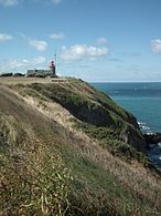 La pointe du roc avec le phare du cap Lihou.