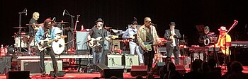 The Mavericks performing on a stage.