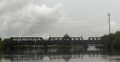 The Baltimore and Ohio Railroad Bridge, built in the late 19th or early 20th century as a two track, swing bridge across the Schuylkill River in the Grays Ferry neighborhood in Philadelphia, Pennsylvania. Now a CSX Philadelphia Subdivision bridge. View of the bridge looking downstream.