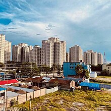 The visible apartment buildings are located in Ishwardi's Notun Haat region. The region is popularly known as Green City. It is a part of Rooppur Nuclear Powerplant.