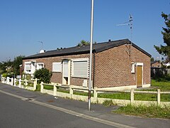 Des habitations post-Nationalisation groupées par deux.