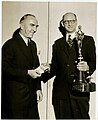 Eddie Rickenbacker (left) presents the Fawcett Aviation Award to Fred E. Weick (right), January 1946