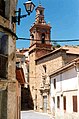 Vista lateral de la iglesia parroquial de (Valencia), con detalle del campanario.