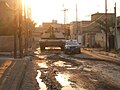 An M1A1 Abrams Main Battle Tank from A Company, 1st Battalion, 77th Armor Regiment prepares to destroy an insurgent vehicle in Baghdad, Iraq in 2007