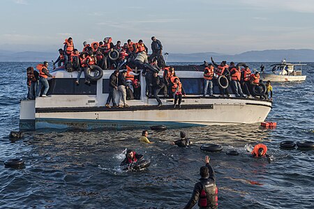 Syrian and Iraqi refugees arriving at Lesbos at European migrant crisis, by Ggia