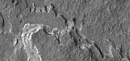 Layers, as seen by HiRISE under HiWish program. Light toned layers may contain minerals rich in water.